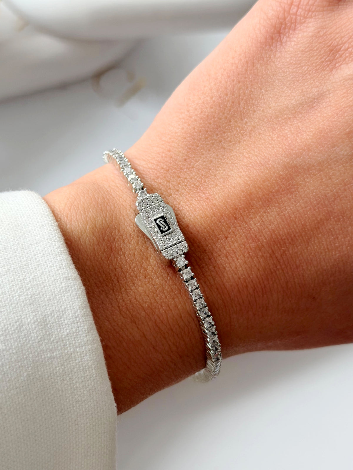 CW1VPBRCLT00190-silver-delicate-round-cz-tennis-bracelet-pave-buckle-clasp-catwalkjewellery wholesale jewelry BRACELETS  Catwalk Jewellery Europe