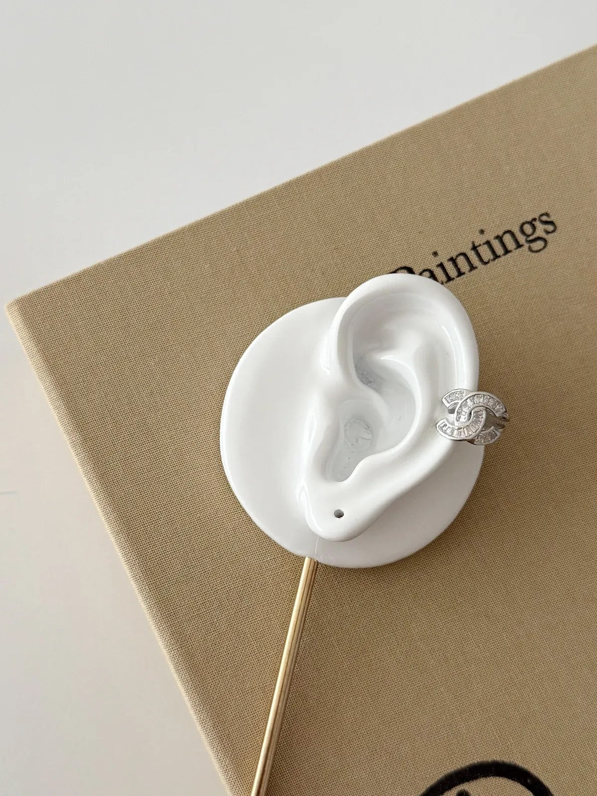 Silver CZ Pave Interlocking Cc Logo Ear Cuff - CW1EARCUFF0094 | Wholesale Stainless Steel Jewelry Catwalk Jewellery Europe