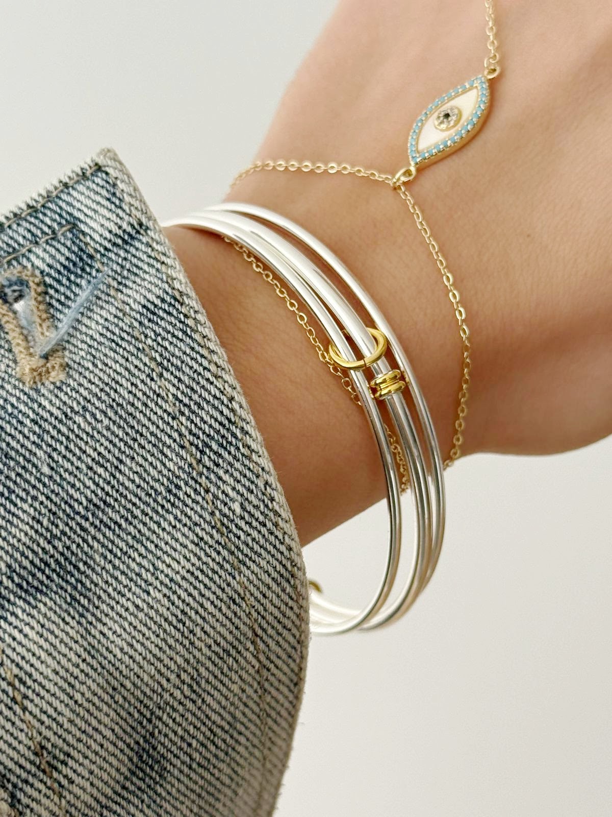 Silver Three Strand Interlocking Gold Accent Bangle Bracelet - CW1CUFF004 | Wholesale Stainless Steel Jewelry Catwalk Jewellery Europe