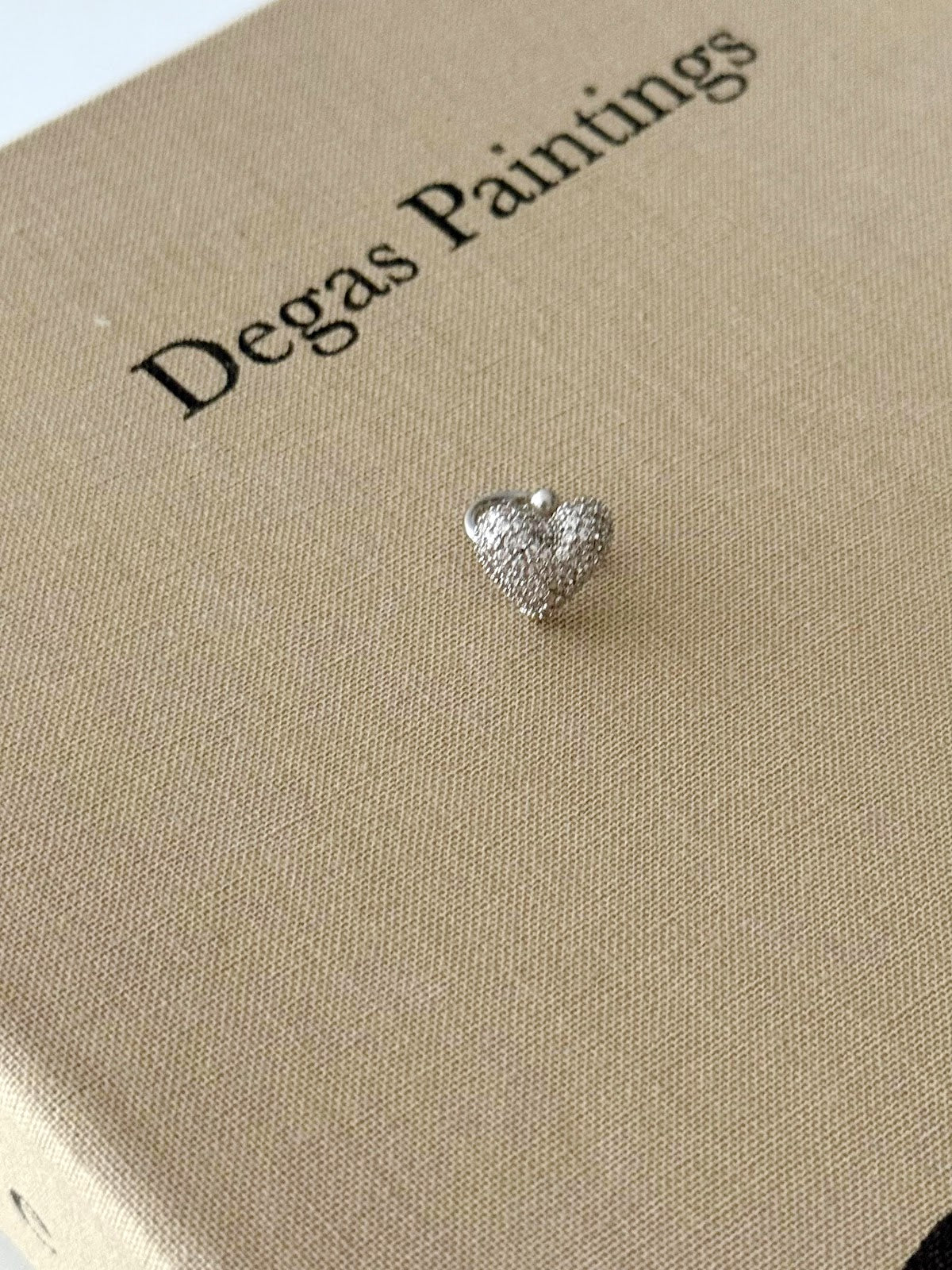 Silver CZ Pave Puffy Heart Ear Cuff Alternate Angle - CW1EARCUFF0046 | Wholesale Stainless Steel Jewelry Catwalk Jewellery Europe