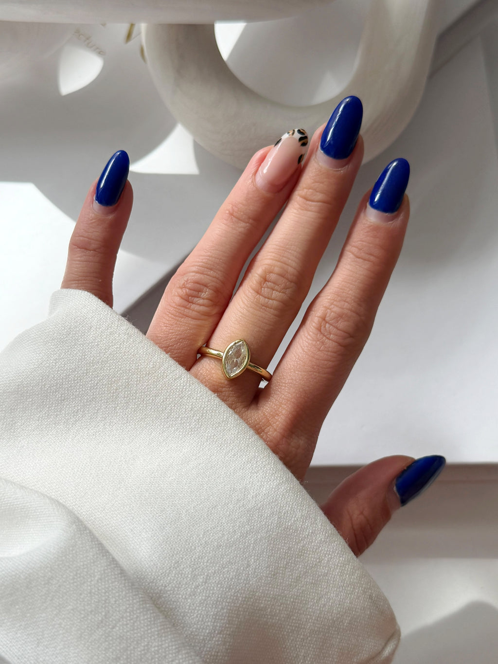 CW1RING0016-gold-bezel-set-marquise-cz-solitaire-ring-catwalkjewellery wholesale jewelry RINGS Catwalk Jewellery Europe