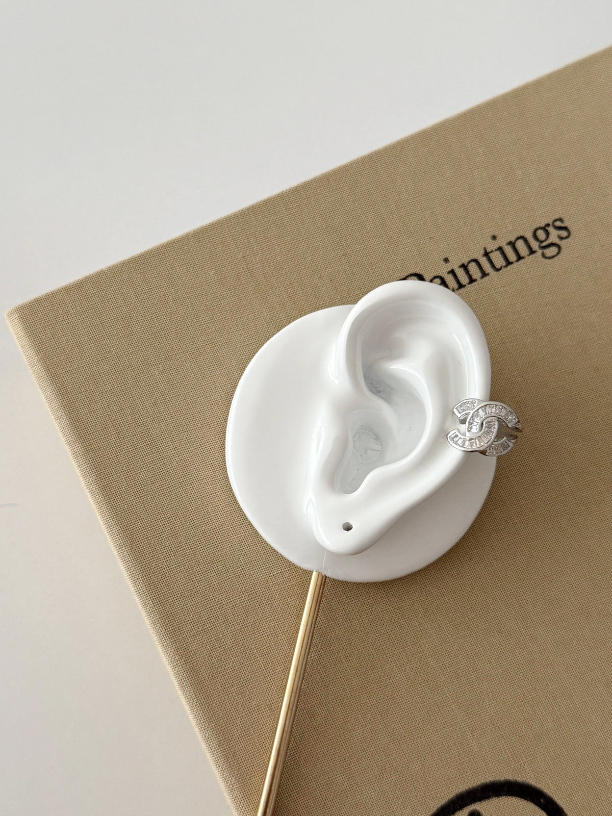Silver CZ Pave Interlocking Cc Logo Ear Cuff - CW1EARCUFF0094 | Wholesale Stainless Steel Jewelry Catwalk Jewellery Europe