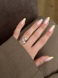 Gold Baguette And Round CZ Cluster Spiral Bypass Ring - CW1RING0093 | Wholesale Stainless Steel Jewelry Catwalk Jewellery Europe