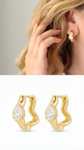 18K Gold Plated Stainless Steel Wavy Organic Pear Cut CZ Huggie Hoop Earrings - CW1VPEARNG00378 | Wholesale Stainless Steel Jewelry Catwalk Jewellery Europe