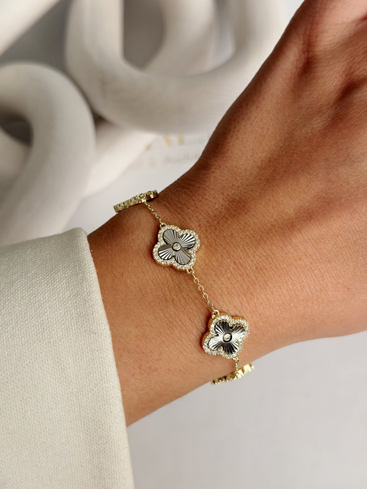 CW1VPBRCLT00102-two-tone-cz-pave-ribbed-clover-motif-station-bracelet-catwalkjewellery wholesale jewelry BRACELETS  Catwalk Jewellery Europe